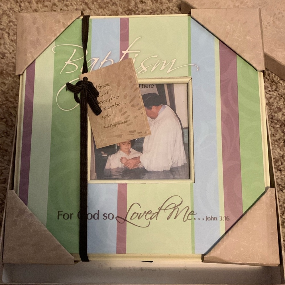 Baptism frame holds 4x4 photo